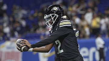 Dec 28, 2024; San Antonio, TX, USA; Colorado Buffaloes quarterback Shedeur Sanders (2) warms up before the game against the Brigham Young Cougars at Alamodome. Mandatory Credit: Troy Taormina-Imagn Images