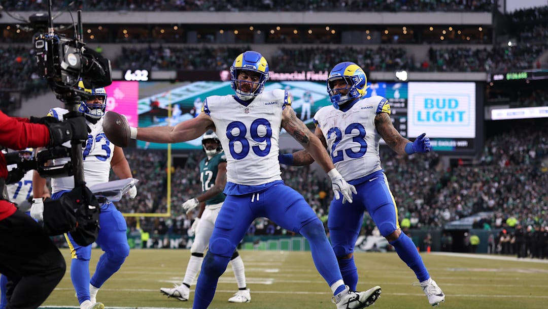 Jan 19, 2025; Philadelphia, Pennsylvania, USA; Los Angeles Rams tight end Tyler Higbee (89) celebrates after scoring a touchdown in the first quarter against the Philadelphia Eagles in a 2025 NFC divisional round game at Lincoln Financial Field. 