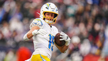Dec 28, 2024; Foxborough, Massachusetts, USA; Los Angeles Chargers wide receiver Ladd McConkey (15) makes the touchdown catch against the New England Patriots in the third quarter at Gillette Stadium. Mandatory Credit: David Butler II-Imagn Images