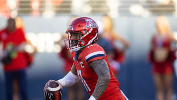 Nov 30, 2024; Tucson, Arizona, USA; Arizona Wildcats quarterback Noah Fifita (11) against the Arizona State Sun Devils during the Territorial Cup at Arizona Stadium. Mandatory Credit: Mark J. Rebilas-Imagn Images