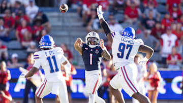 Nov 8, 2025; Tucson, Arizona, USA; Arizona Wildcats quarterback Noah Fifita (1) throws a pass against the Kansas Jayhawks in the second half at Arizona Stadium. Mandatory Credit: Mark J. Rebilas-Imagn Images