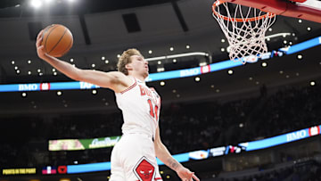 Oct 16, 2025; Chicago, Illinois, USA; Chicago Bulls forward Matas Buzelis (14) goes up for a dunk against the Minnesota Timberwolves during the second half at United Center. Mandatory Credit: David Banks-Imagn Images