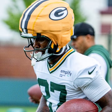 Green Bay Packers wide receiver Romeo Doubs (87) runs the ball during the second day of training camp on July 24.