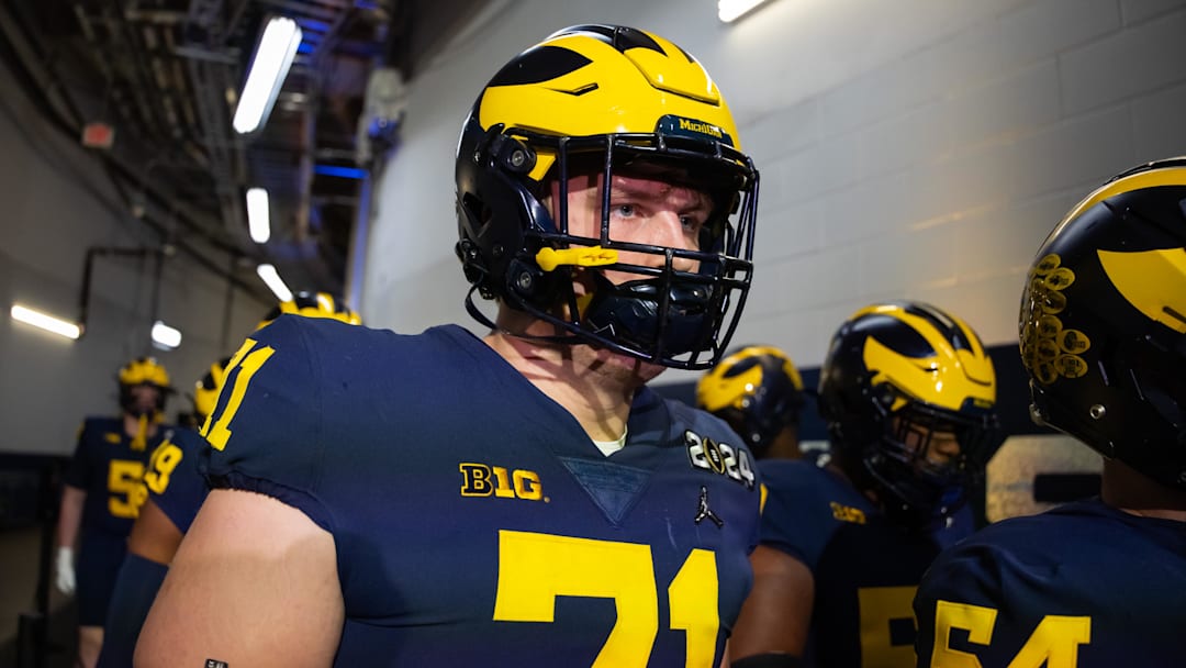 Jan 8, 2024; Houston, TX, USA; Michigan Wolverines offensive lineman Evan Link (71) against the Washington Huskies during the 2024 College Football Playoff national championship game.