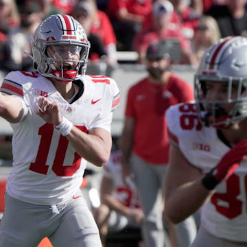 Oct 18, 2025; Madison, Wisconsin, USA; Ohio State quarterback Julian Sayin (10) throws a pass during the during the first quarter of their game against Wisconsin at Camp Randall Stadium.