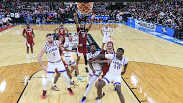 Mar 20, 2025; Providence, RI, USA;  Arkansas Razorbacks forward Jonas Aidoo (9) makes a free throw against Kansas Jayhawks during the second half at Amica Mutual Pavilion. Mandatory Credit: Eric Canha-Imagn Images