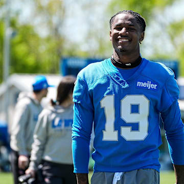 Detroit Lions wide receiver Dominic Lovett (19) smiles as he walks off the field after practice during rookie mini camp at Meijer Performance Center in Allen Park on Friday, May 9, 2025.