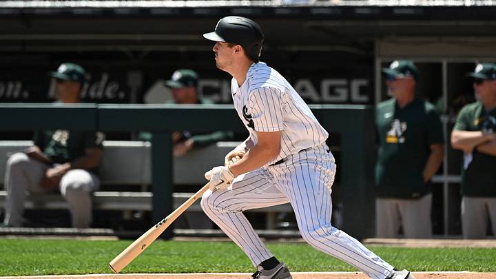 Jul 12, 2026; Chicago, Illinois, USA;  Chicago White Sox catcher Kyle Teel (8) hits a two-RBI single against the Athletics during the first inning at Rate Field. Mandatory Credit: Matt Marton-Imagn Images