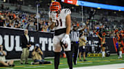 Aug 22, 2024; Cincinnati, Ohio, USA; Cincinnati Bengals wide receiver Jermaine Burton (81) reacts after scoring a touchdown against the Indianapolis Colts in the second half at Paycor Stadium. Mandatory Credit: Katie Stratman-Imagn Images