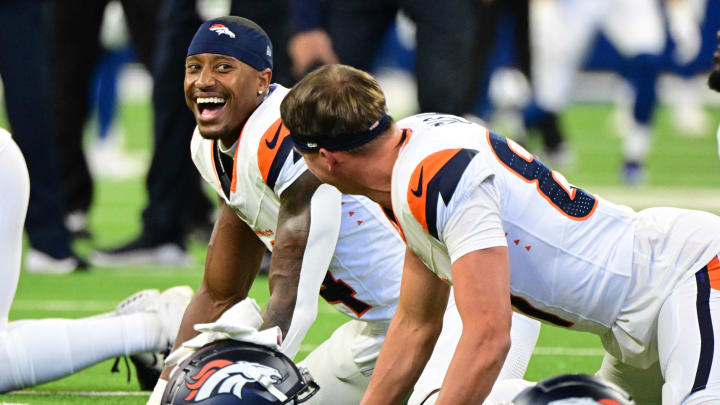 Aug 11, 2024; Indianapolis, Indiana, USA; Denver Broncos wide receiver Courtland Sutton (14) smiles while warming up before the game against the Indianapolis Colts at Lucas Oil Stadium. 