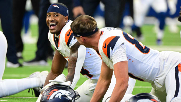 Aug 11, 2024; Indianapolis, Indiana, USA; Denver Broncos wide receiver Courtland Sutton (14) smiles while warming up before the game against the Indianapolis Colts at Lucas Oil Stadium.