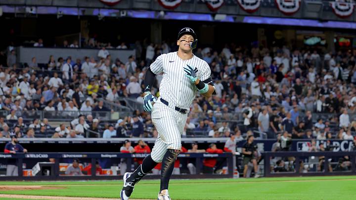 Sep 30, 2025; Bronx, New York, USA; New York Yankees right fielder Aaron Judge (99) reacts after flying out during the third inning of game one of the Wildcard round of the 2025 MLB playoffs against the Boston Red Sox at Yankee Stadium. Mandatory Credit: Brad Penner-Imagn Images