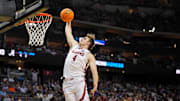Mar 27, 2025; Newark, NJ, USA; Alabama Crimson Tide forward Grant Nelson (4) dunks the during the first half against the Brigham Young Cougars during an East Regional semifinal of the 2025 NCAA tournament at Prudential Center. Mandatory Credit: Robert Deutsch-Imagn Images