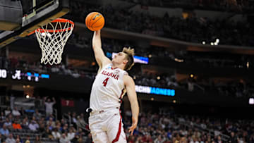 Mar 27, 2025; Newark, NJ, USA; Alabama Crimson Tide forward Grant Nelson (4) dunks the during the first half against the Brigham Young Cougars during an East Regional semifinal of the 2025 NCAA tournament at Prudential Center. Mandatory Credit: Robert Deutsch-Imagn Images