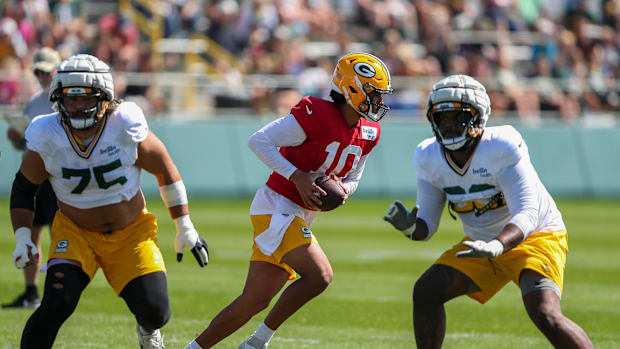 Green Bay Packers quarterback Jordan Love (10) runs through a drill during practice on Tuesday, August 20, 2024, at Ray Nitsc