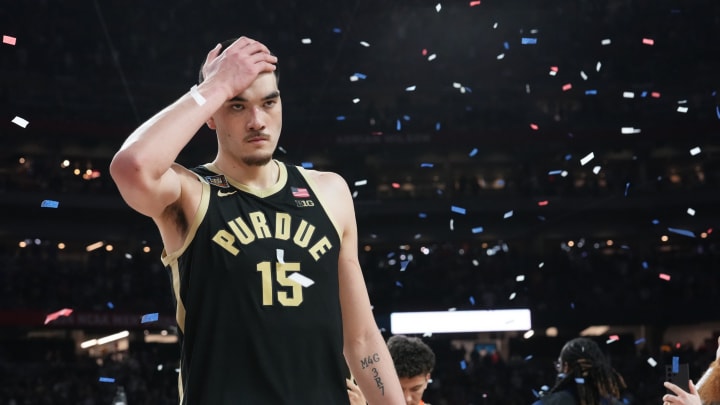 A dejected Purdue Boilermakers center Zach Edey (15) walks off the court after losing the Men's NCAA national championship game to Connecticut Huskies at State Farm Stadium in Glendale on April 8, 2024.