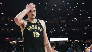 A dejected Purdue Boilermakers center Zach Edey (15) walks off the court after losing the Men's NCAA national championship game to Connecticut Huskies at State Farm Stadium in Glendale on April 8, 2024.