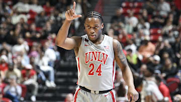 Jan 30, 2024; Las Vegas, Nevada, USA; UNLV Rebels guard Jackie Johnson III (24) reacts to scoring on