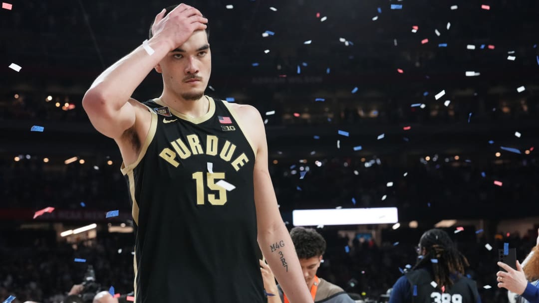 A dejected Purdue Boilermakers center Zach Edey (15) walks off the court after losing the Men's NCAA national championship game to Connecticut Huskies at State Farm Stadium in Glendale on April 8, 2024.