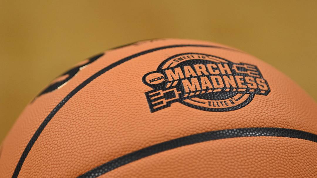 Mar 26, 2026; San Jose, CA, USA; The NCAA March Madness logo is seen on a basketball in the first half between the Texas Longhorns and the Purdue Boilermakers during a Sweet Sixteen game of the West Regional of the men's 2026 NCAA Tournament at SAP Center. Mandatory Credit: Eakin Howard-Imagn Images