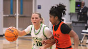 Beachside guard Morgan Cremen (10) dribbles into the lane as Orange Park guard Mariah Young (3) defends during an FHSAA Region 1-5A high school girls basketball playoff on Feb. 13, 2025. [Clayton Freeman/Florida Times-Union]