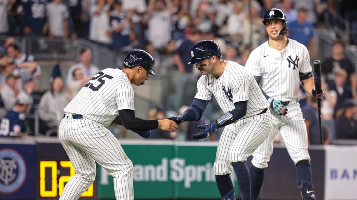 Aug 30, 2024; Bronx, New York, USA; New York Yankees catcher Austin Wells (28) celebrates with second baseman Gleyber Torres (25) after hitting a two run home run during the eighth inning against the St. Louis Cardinals at Yankee Stadium. Mandatory Credit: Vincent Carchietta-USA TODAY Sports