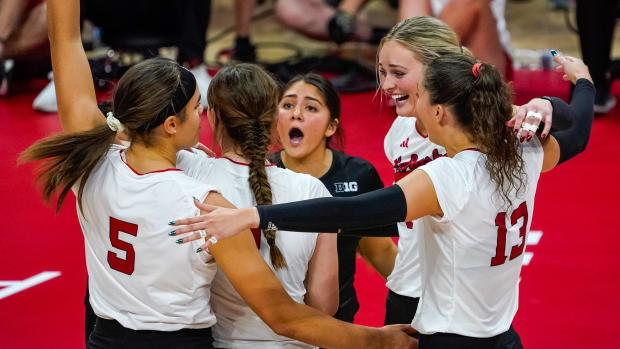 The Nebraska Cornhuskers celebrate after a point against the Wisconsin Badgers