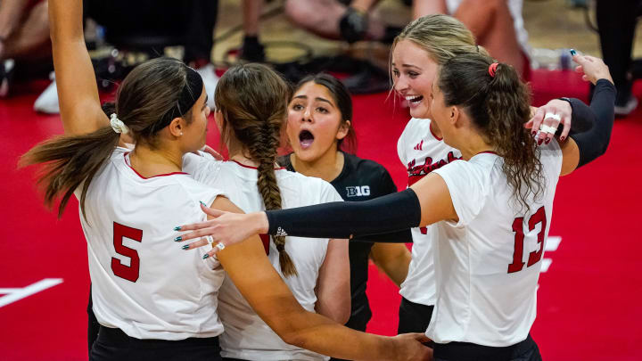 Oct 21, 2023; Lincoln, NE, USA; The Nebraska Cornhuskers celebrate after a point against the Wisconsin Badgers during the fifth set at the Bob Devaney Sports Center.