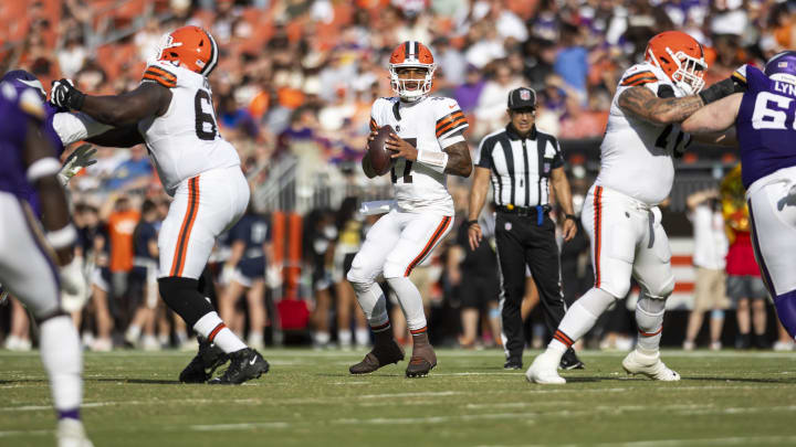 Aug 17, 2024; Cleveland, Ohio, USA; Cleveland Browns quarterback Dorian Thompson-Robinson (17) looks for an available receiver against the Minnesota Vikings during the second quarter at Cleveland Browns Stadium. Mandatory Credit: Scott Galvin-USA TODAY Sports