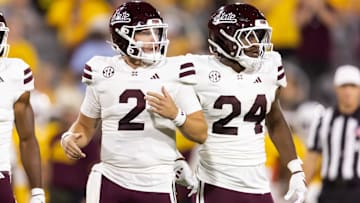 Sep 7, 2024; Tempe, Arizona, USA; Mississippi State Bulldogs quarterback Blake Shapen (2) with running back Keyvone Lee (24) against the Arizona State Sun Devils at Mountain America Stadium. Mandatory Credit: Mark J. Rebilas-Imagn Images