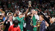 Jun 17, 2024; Boston, Massachusetts, USA; Boston Celtics guard Jaylen Brown (7) holds the MVP trophy after winning the 2024 NBA Finals against the Dallas Mavericks at TD Garden. Mandatory Credit: Peter Casey-Imagn Images