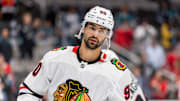 Mar 13, 2025; San Jose, California, USA; Chicago Blackhawks center Joe Veleno (90) warms up before the game against the San Jose Sharks at SAP Center at San Jose. Mandatory Credit: Bob Kupbens-Imagn Images