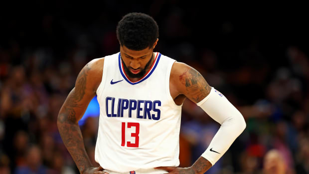 Apr 9, 2024; Phoenix, Arizona, USA;  LA Clippers forward Paul George (13) reacts during the fourth quarter of the game against the Phoenix Suns at Footprint Center. Mandatory Credit: Mark J. Rebilas-USA TODAY Sports