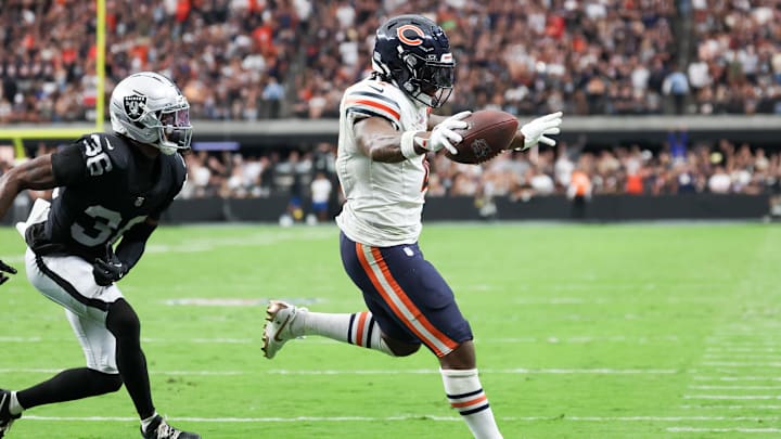 Sep 28, 2025; Paradise, Nevada, USA; Chicago Bears running back d'Andre Swift (4) runs the ball for a touchdown during the second half against the Las Vegas Raiders at Allegiant Stadium. Mandatory Credit: Kiyoshi Mio-Imagn Images