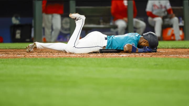 Seattle Mariners center fielder Victor Robles (10) reacts after being hit by a pitch during the seventh inning against the Philadelphia Phillies at T-Mobile Park on Aug 3.