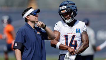 Jul 24, 2025; Englewood, CO, USA; Denver Broncos wide receiver Courtland Sutton (14) and passing game specialist Zack Grossi during Denver Broncos Training Camp. Mandatory Credit: Isaiah J. Downing-Imagn Images