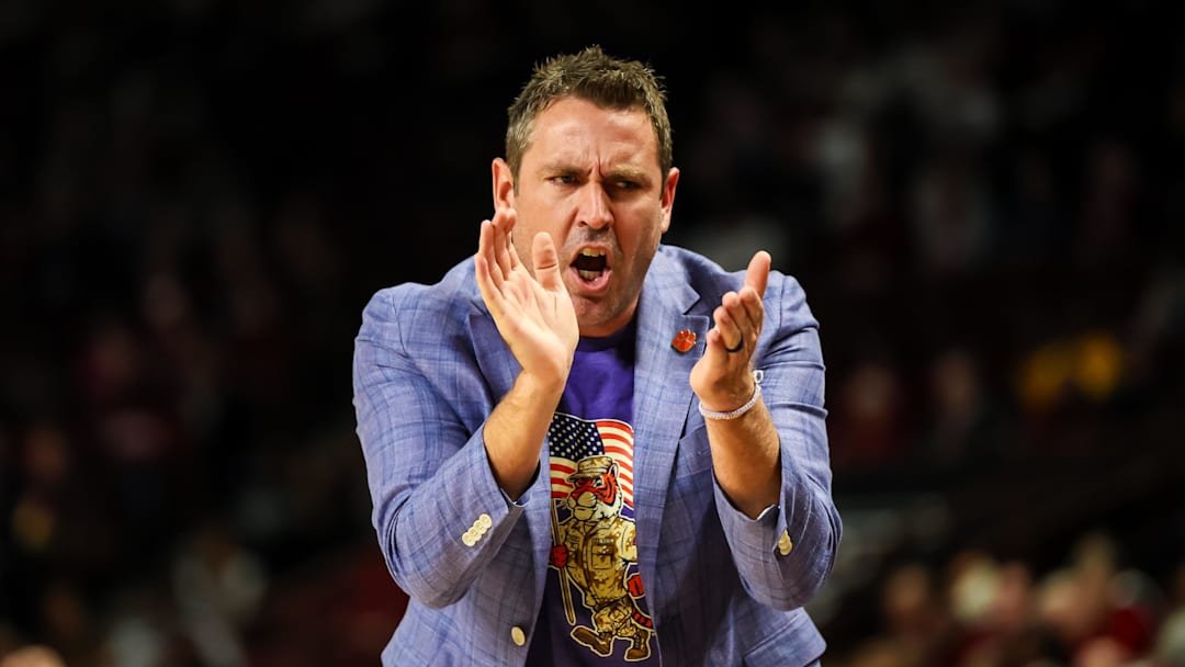 Nov 11, 2025; Columbia, South Carolina, USA; Clemson Tigers head coach Shawn Poppie directs his team against the South Carolina Gamecocks in the first half at Colonial Life Arena. Mandatory Credit: Jeff Blake-Imagn Images