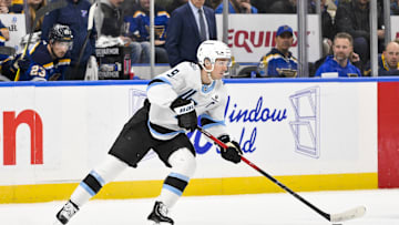 Nov 29, 2025; St. Louis, Missouri, USA; Utah Mammoth center Clayton Keller (9) controls the puck against the St. Louis Blues during the second period at Enterprise Center. Mandatory Credit: Jeff Curry-Imagn Images