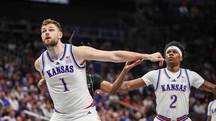 Mar 12, 2025; Kansas City, MO, USA; Kansas Jayhawks center Hunter Dickinson (1) blocks out during the second half against the UCF Knights at T-Mobile Center. Mandatory Credit: William Purnell-Imagn Images