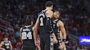 Dec 11, 2023; Houston, Texas, USA; San Antonio Spurs center Victor Wembanyama (1) celebrates with forward Keldon Johnson (3) after scoring a basket during the third quarter against the Houston Rockets at Toyota Center.