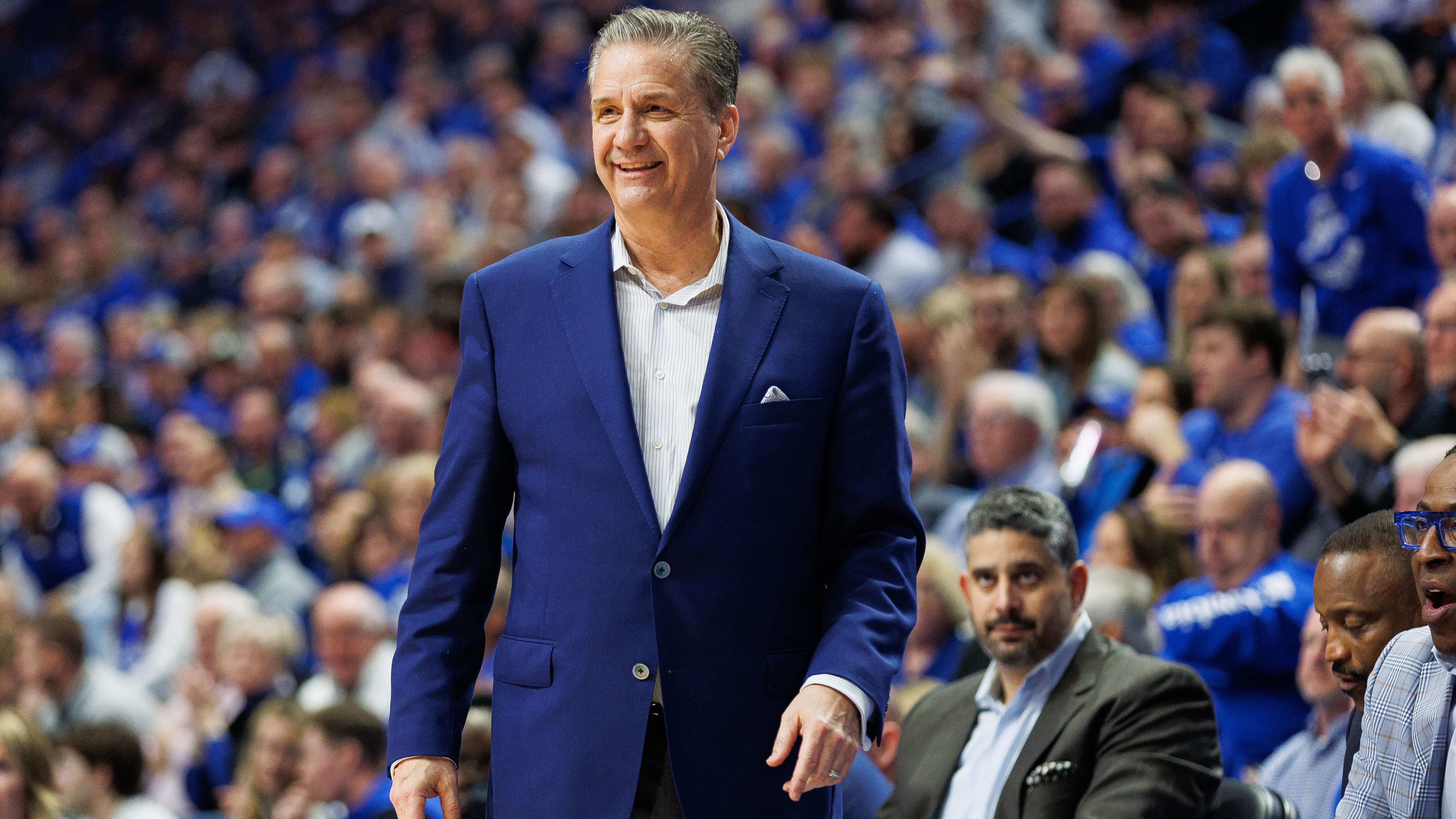 Former Kentucky coach John Calipari smiles during the game against Vanderbilt.