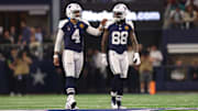 Dallas Cowboys WR CeeDee Lamb and QB Dak Prescott talk during the game against the Washington Commanders.