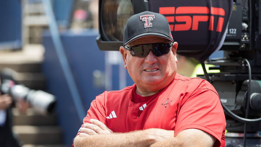 May 30, 2026; Oklahoma City, OK, USA; Texas Tech Red Raiders head coach Gerry Glasco watches warmups before the game against the Tennessee Lady Volunteers during the NCAA Women’s College World Series at Devon Park. Mandatory Credit: Brett Rojo-Imagn Images May 30, 2026; Oklahoma City, OK, USA; Texas Tech Red Raiders head coach Gerry Glasco watches warmups before the game against the Tennessee Lady Volunteers during the NCAA Women’s College World Series at Devon Park. Mandatory Credit: Brett Rojo-Imagn Images