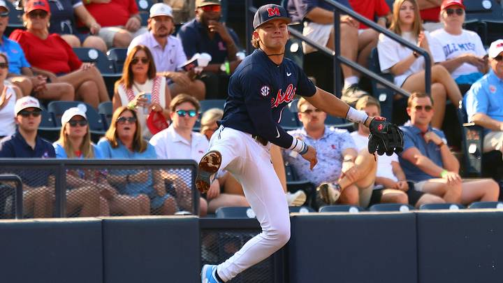 Jun 2, 2025: Mississippi Rebels third base Luke Hill (7) fields a ground ball during the second inning against the Murray State Racers. 