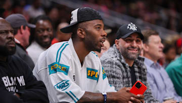 Apr 6, 2025; Atlanta, Georgia, USA; Atlanta Falcons tight end Kyle Pitts (8) watches a game between the Atlanta Hawks and Utah Jazz in the second quarter at State Farm Arena. Mandatory Credit: Brett Davis-Imagn Images