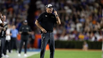 Oct 5, 2024; Gainesville, Florida, USA; UCF Knights head coach Gus Malzahn looks on against the Florida Gators during the first half at Ben Hill Griffin Stadium. Mandatory Credit: Matt Pendleton-Imagn Images