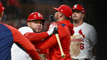 Aug 25, 2025; St. Louis, Missouri, USA;  St. Louis Cardinals designated hitter Willson Contreras (40) is held back by manager Oliver Marmol (37) after he was ejected by umpire Derek Thomas (not pictured) during the seventh inning against the Pittsburgh Pirates at Busch Stadium. Mandatory Credit: Jeff Curry-Imagn Images