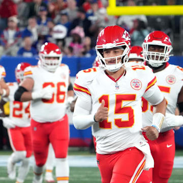 Sep 21, 2025; East Rutherford, New Jersey, USA; Kansas City Chiefs quarterback Patrick Mahomes (15) runs on field before the game against the New York Giants at MetLife Stadium. Mandatory Credit: Robert Deutsch-Imagn Images