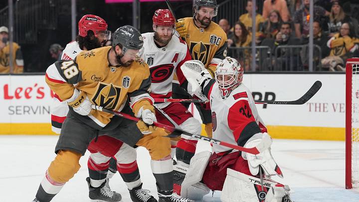 Jun 9, 2026; Las Vegas, Nevada, USA; Carolina Hurricanes goaltender Brandon Bussi (32) makes a save against Vegas Golden Knights center Tomas Hertl (48) during the 3rd period in game four of the 2026 Stanley Cup Final at T-Mobile Arena. Mandatory Credit: Lucas Peltier-Imagn Images
