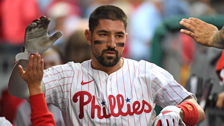 Aug 18, 2025; Philadelphia, Pennsylvania, USA; Philadelphia Phillies outfielder Nick Castellanos (8) celebrates in the dugout after scoring a run during the second inning against the Seattle Mariners at Citizens Bank Park. Mandatory Credit: Eric Hartline-Imagn Images